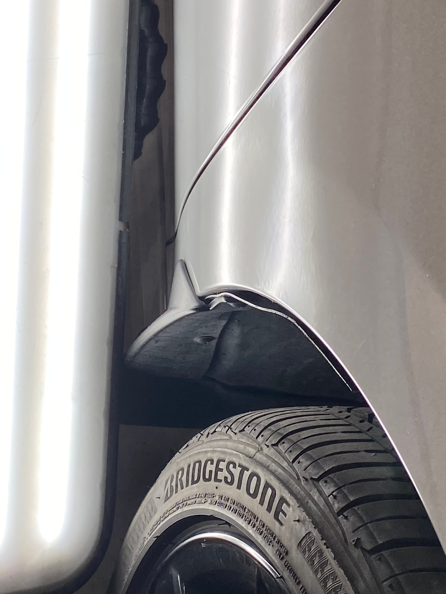 Fender dent repair after paintless dent repair